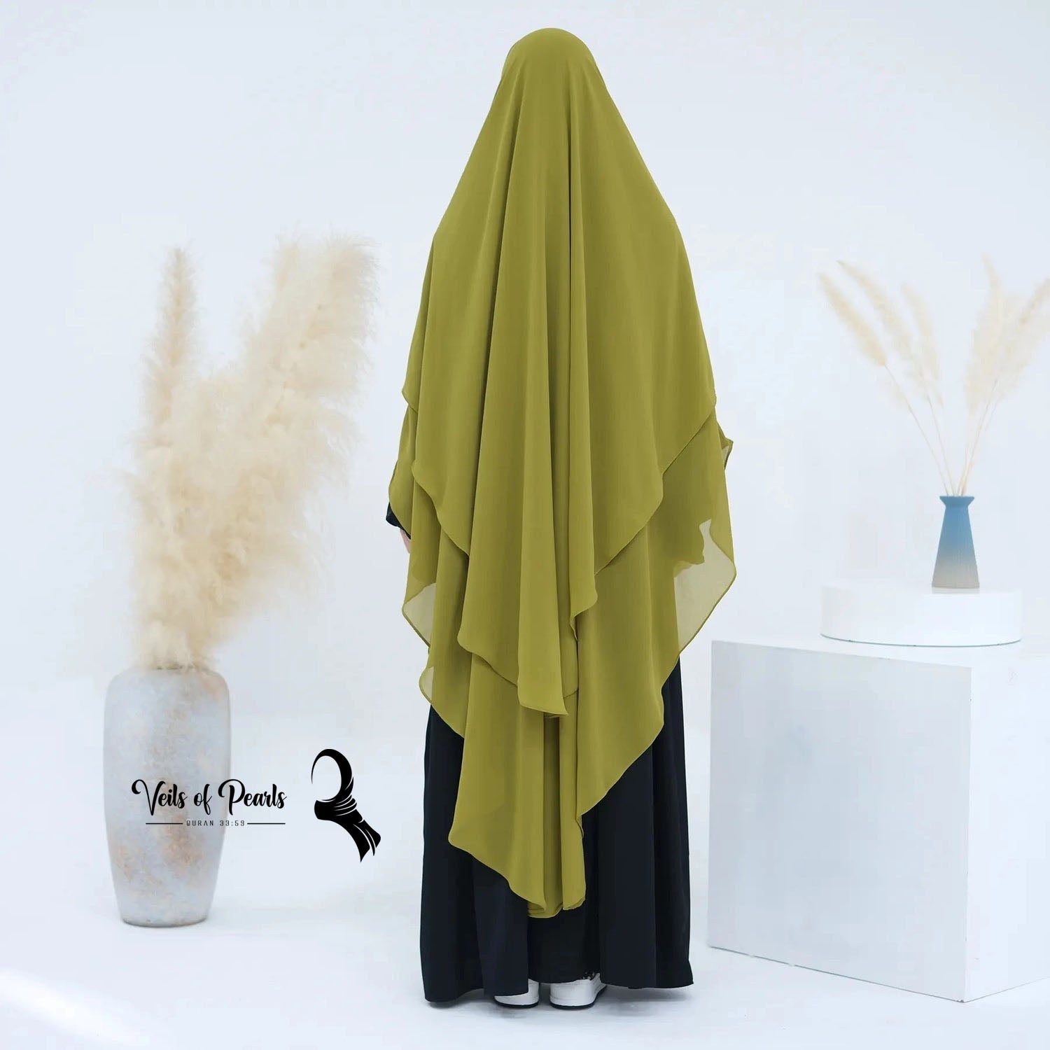 Enhance Your Modest Wardrobe with a Two Layers Abaya by Veils of Pearls Pesto Green