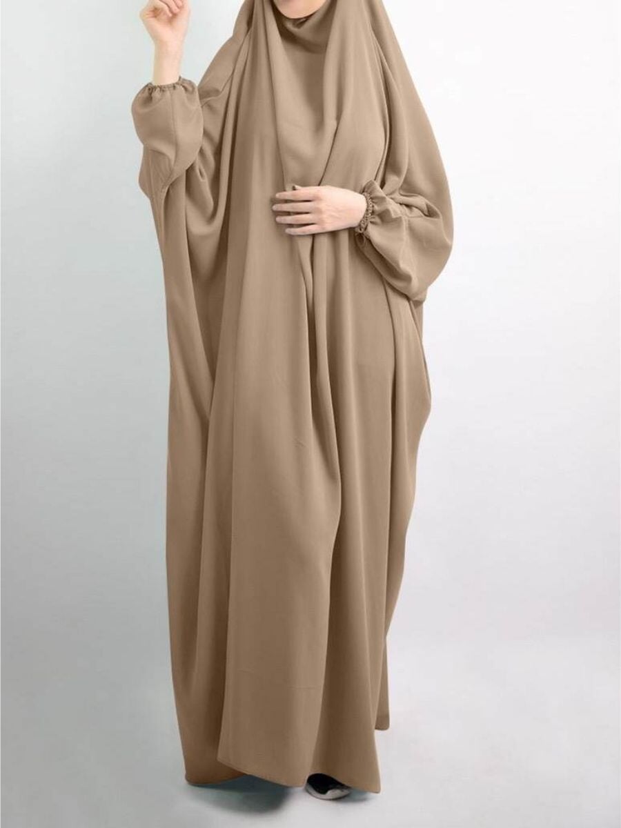  one-piece jilbab with attached khimar and long sleeves in a soft almond frost color